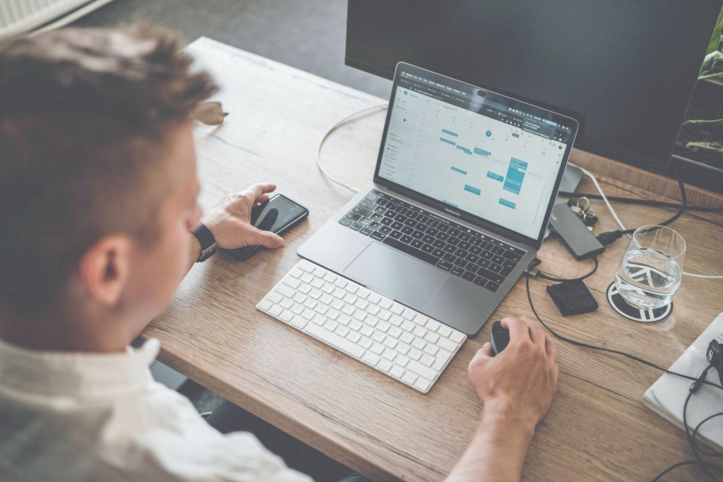 Financial planning workspace with documents and analysis charts